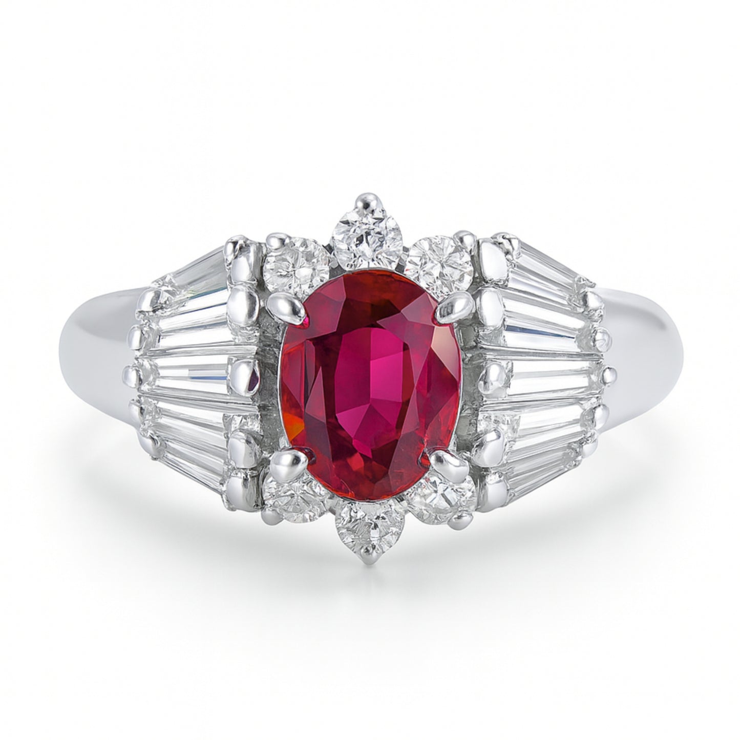 Platinum 0.73ct Oval Ruby 0.55cttw Round and Tapered Baguette White Diamonds Designer Ring