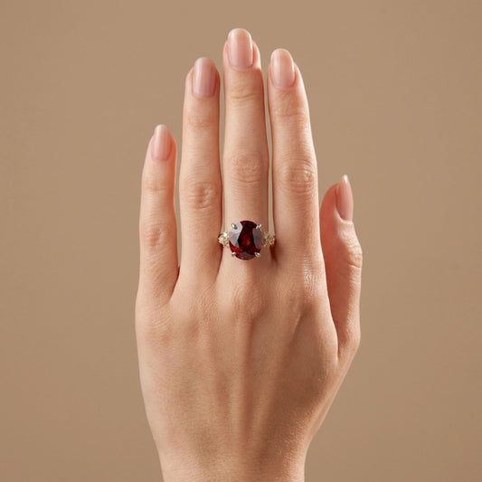14K 12.88ct Oval Spessartite Garnet 0.24cttw VS Yellow Diamonds Ring