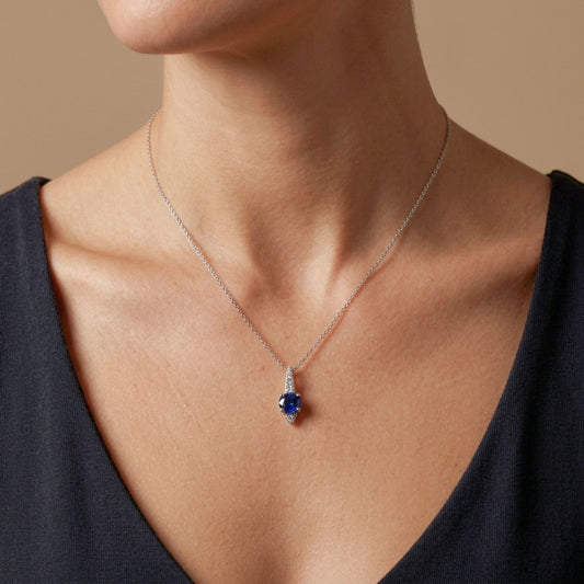 14K 0.45ct Oval Blue Sapphire 0.07cttw White Diamonds Pendant