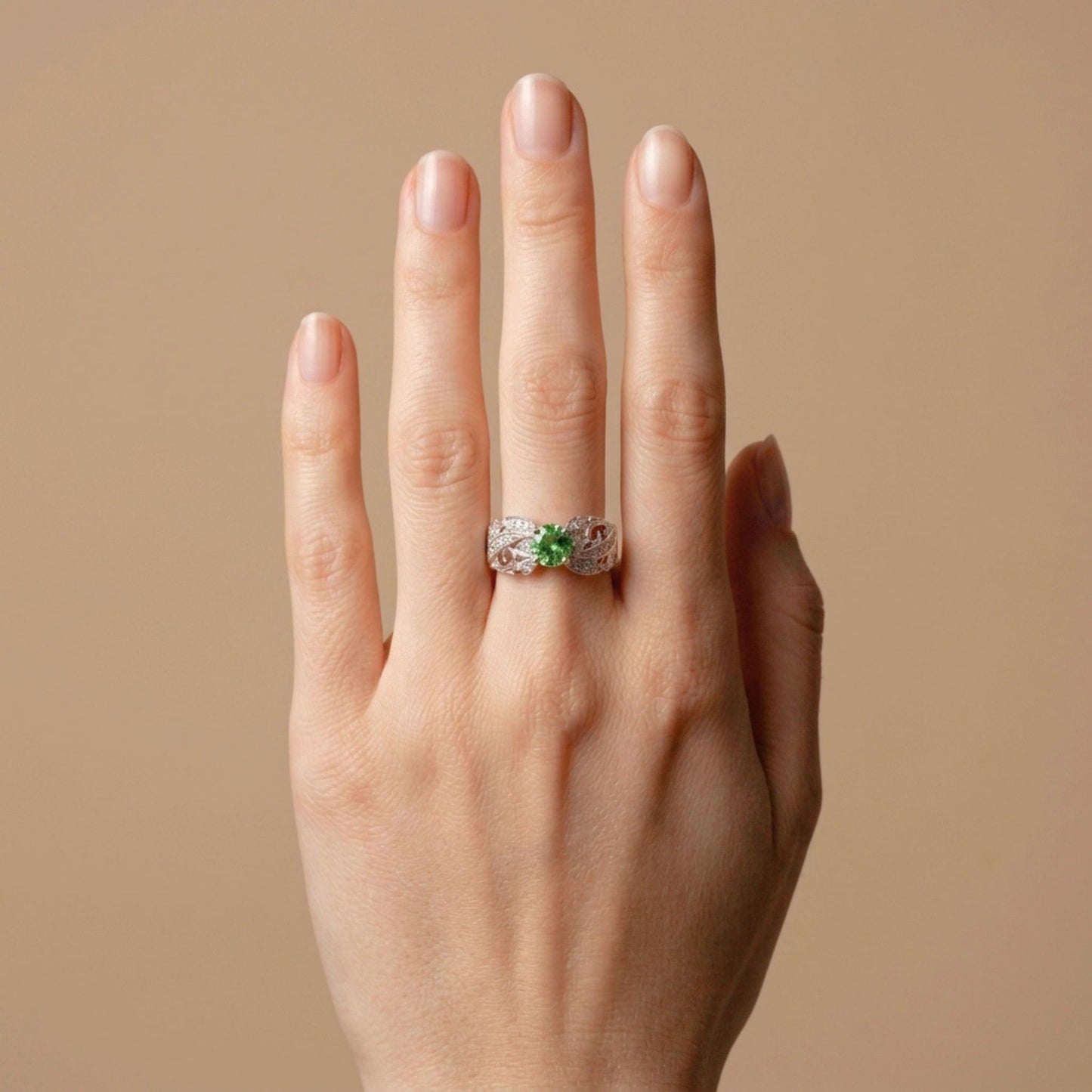14K 1.12ct Oval Tsavorite 0.21cttw VS White Diamonds Ring