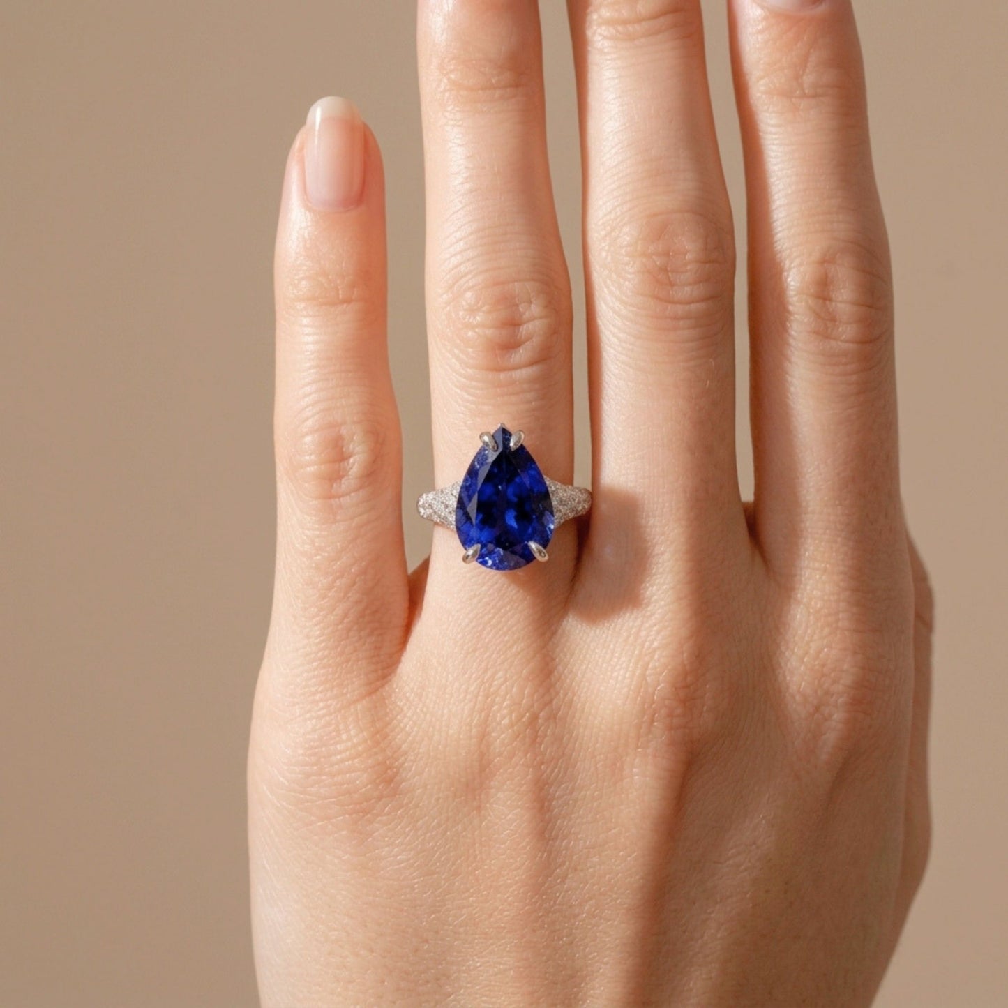 14K 8.51ct Pear Shape Blue Wing Tanzanite 1.07cttw VS White Diamonds Ring