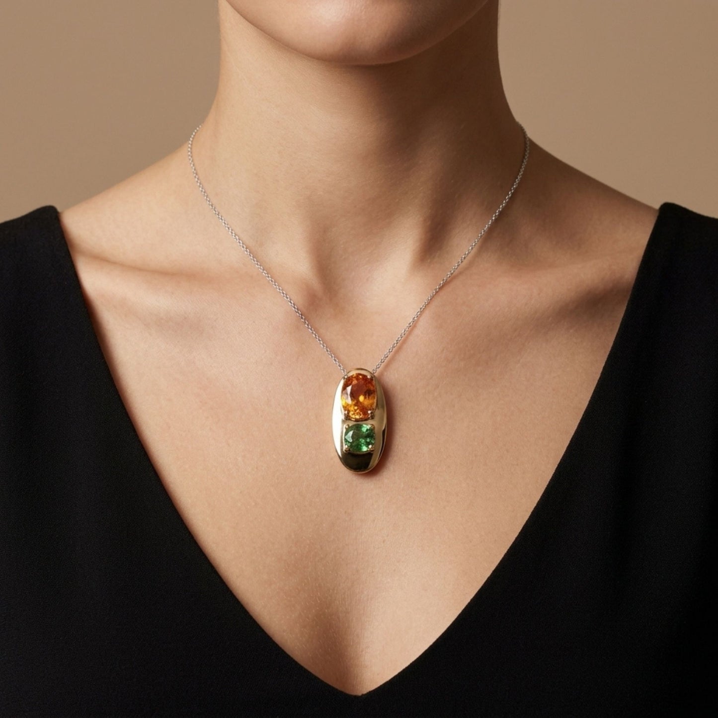 14K 2.24ct Oval Mandarin Garnet 0.66ct Oval Tsavorite Pendant