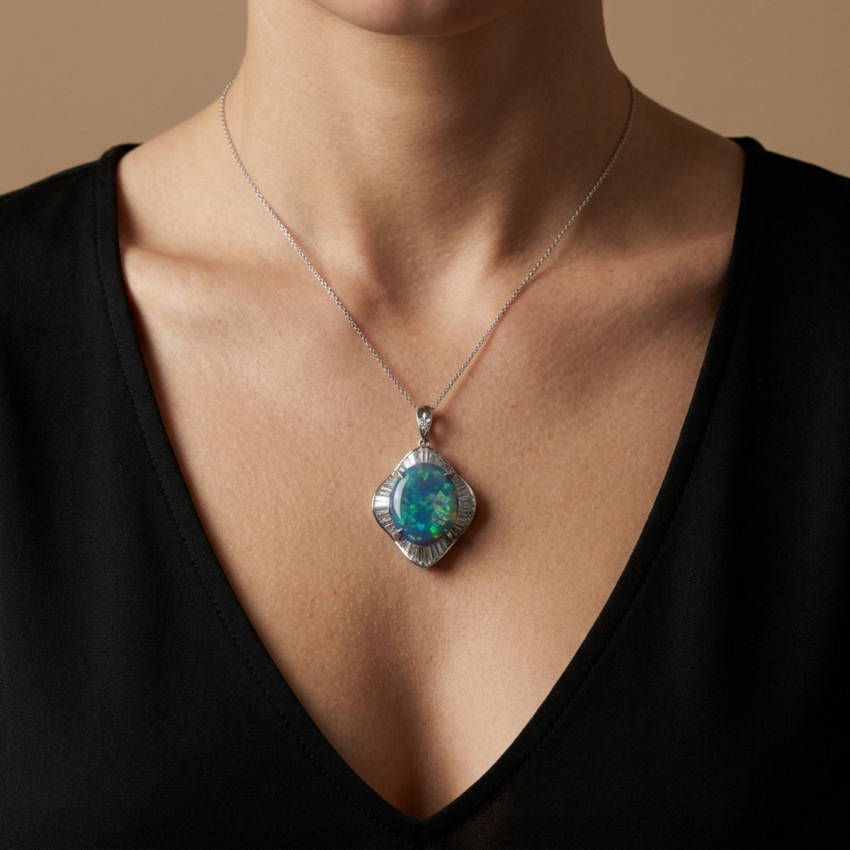 Platinum 9.03ct oval black opal pendant with 2.20cttw white diamonds