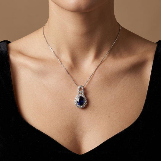 Platinum 2.91ct Oval Blue Sapphire 1.50cttw White Diamonds Necklace