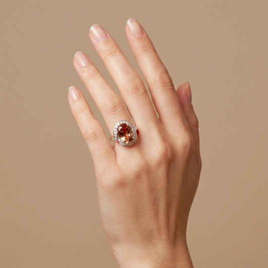 Platinum 5.10ct Oval Imperial Topaz 0.35cttw White Diamonds Ring