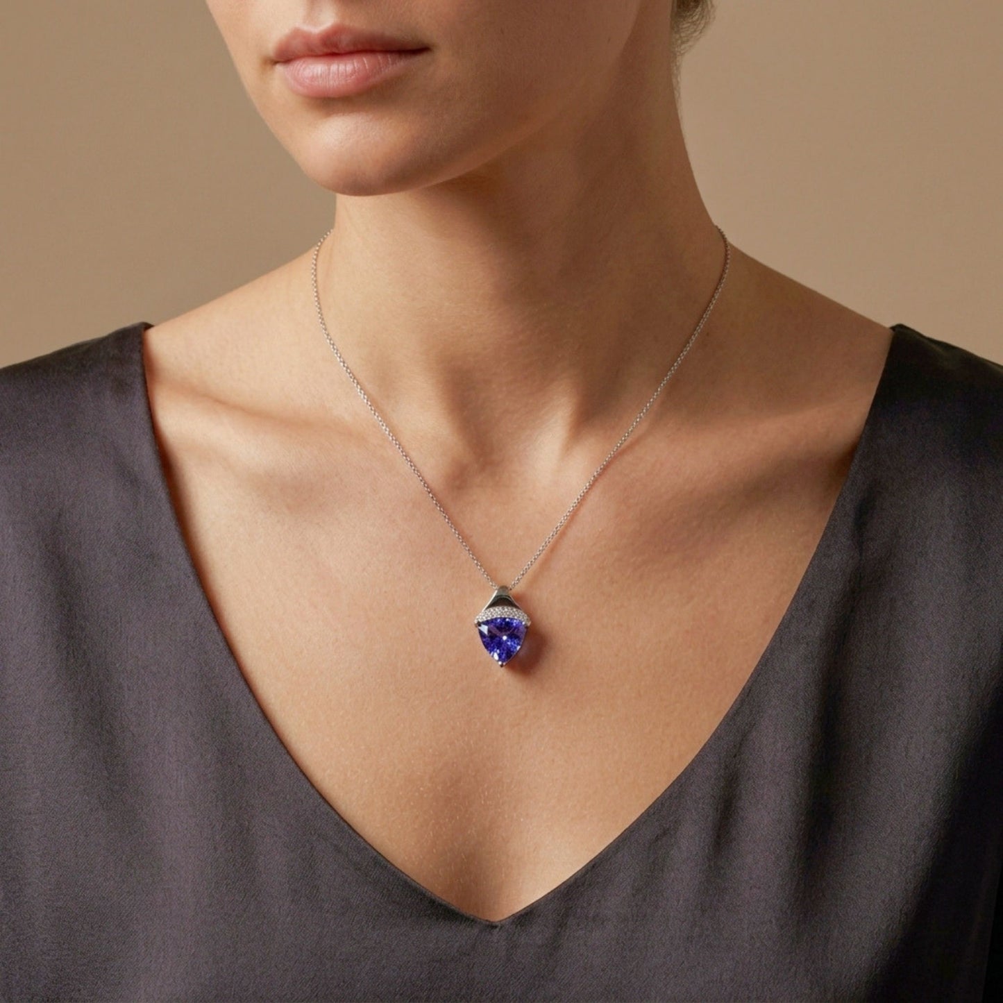 14K 1.80ct Trilliant Blue Wing Tanzanite 0.08cttw VS White Diamonds Pendant