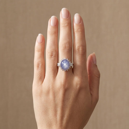 Platinum 11.83ct Oval Star Sapphire 0.71cttw White Diamonds Ring