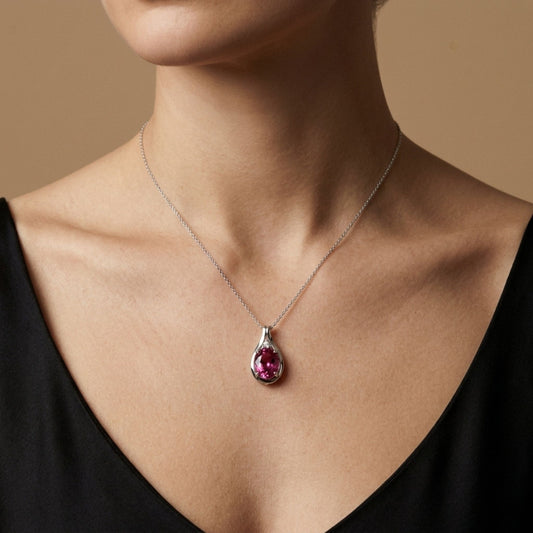 18K 2.07ct Oval Pink Tourmaline 0.04cttw White Diamonds Pendant