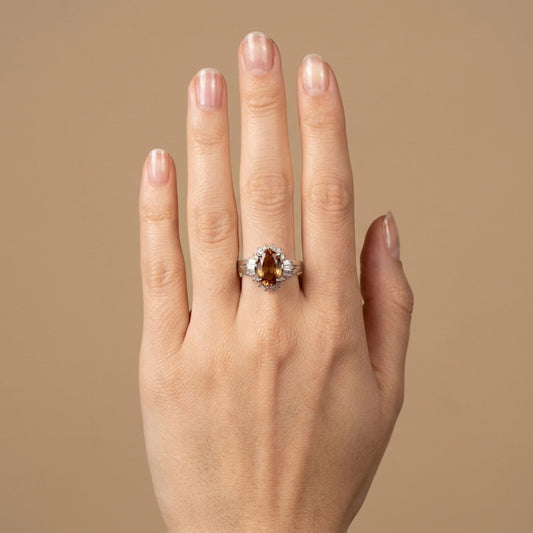 Platinum 1.76ct Oval Imperial Topaz 0.49cttw White Diamonds Ring