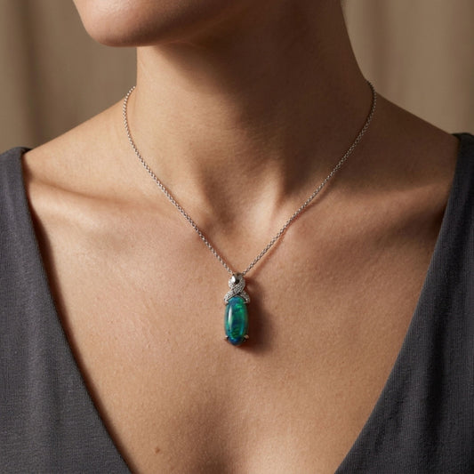 18K 4.87cttw Oval Black Opal 0.10cttw White Diamonds Necklace