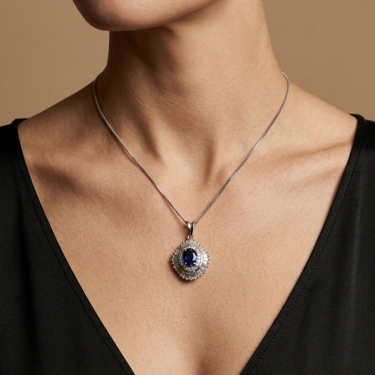 Platinum 1.39ct Oval Blue Sapphire 1.45cttw White Diamonds Necklace