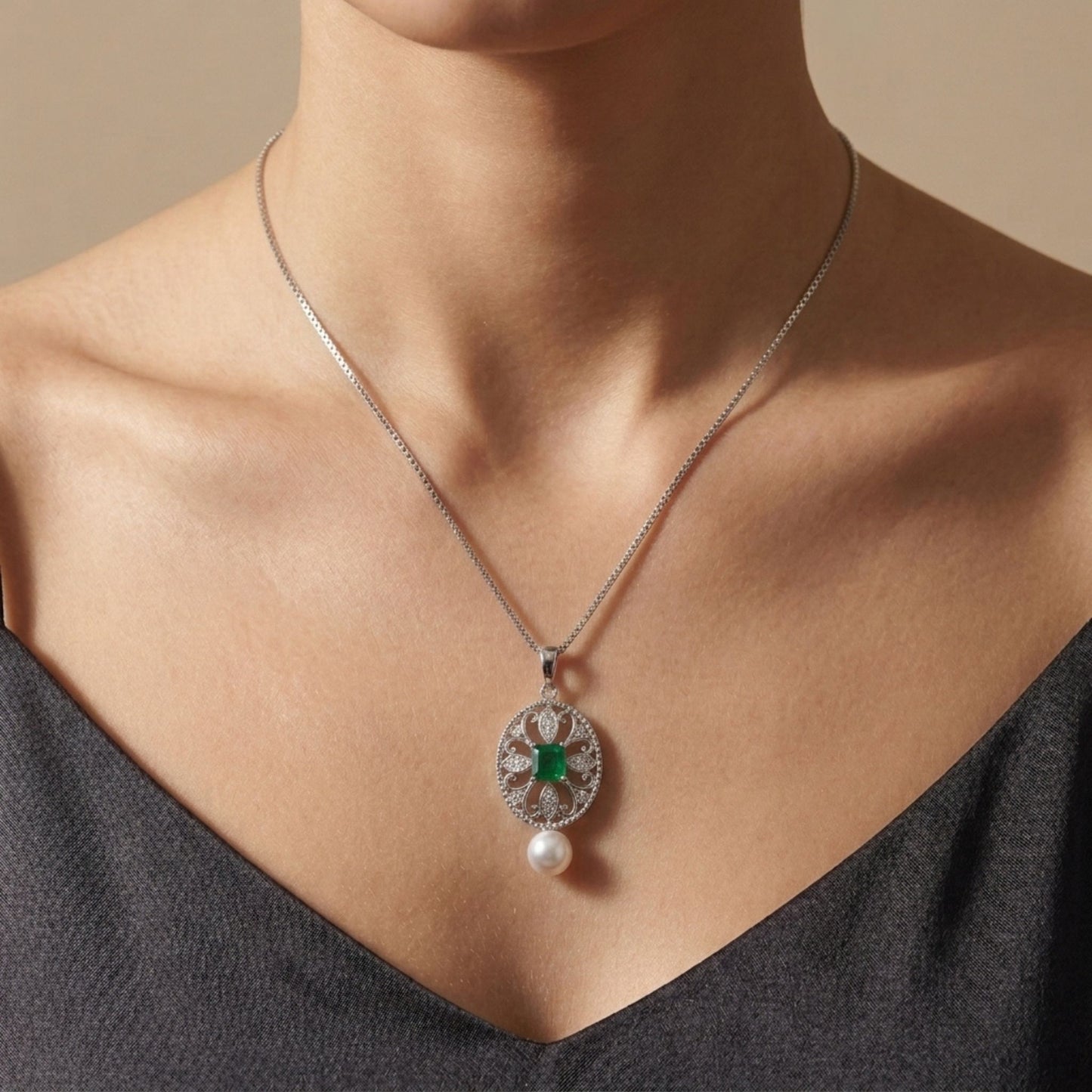 18K 0.34ct Emerald Cut Colombian Emerald 6.1mm Freshwater White Pearl 0.10cttw White Diamonds Necklace