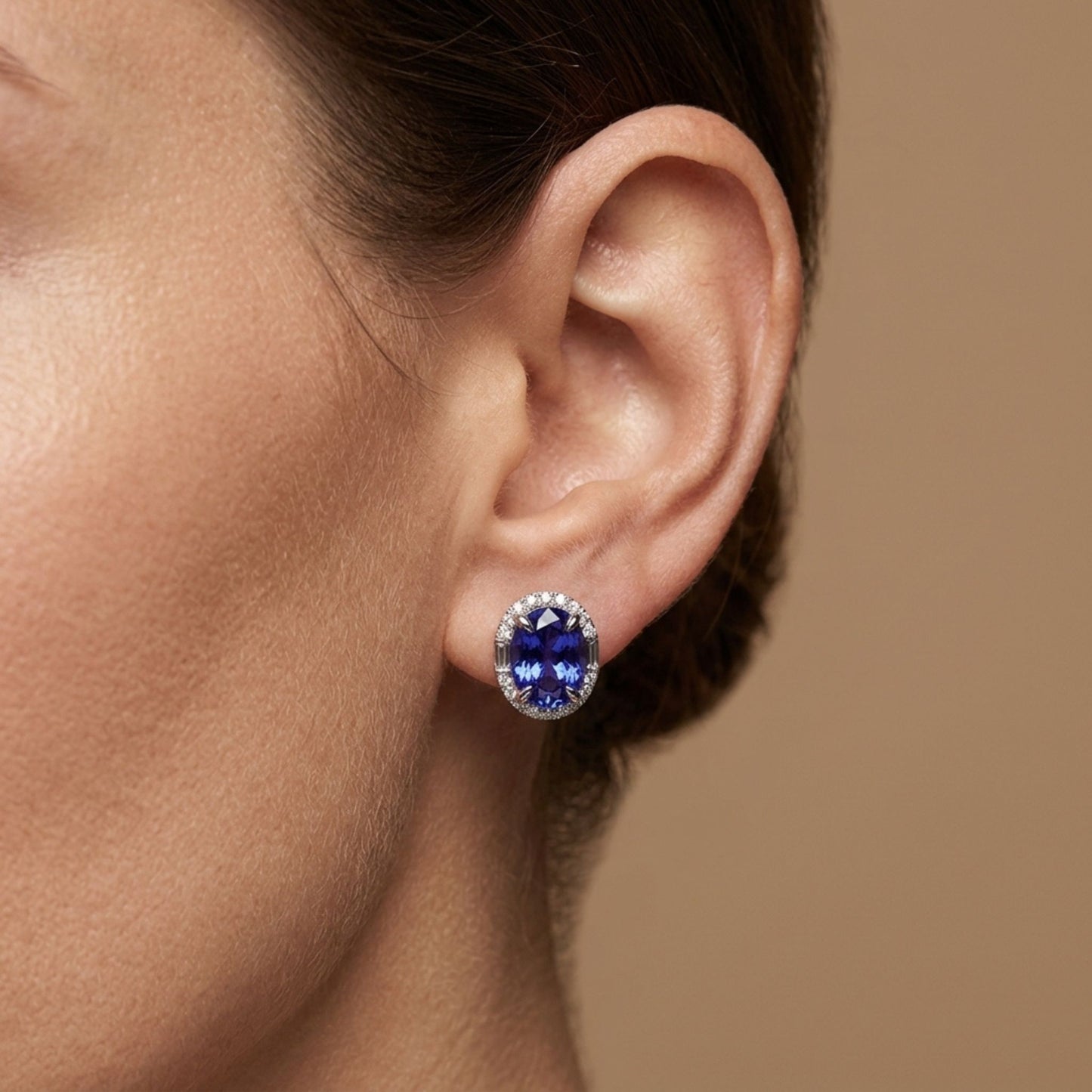 18K 6.42cttw Oval Blue Wing Tanzanite 0.61cttw White Diamonds Stud Earrings