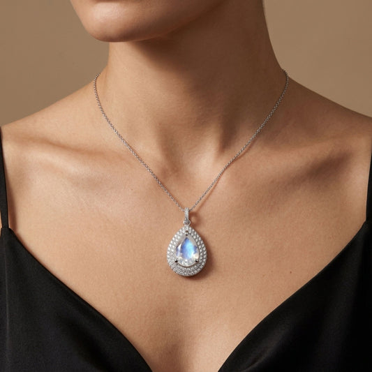 18K 3.28ct Pear Shape Moonstone 0.62cttw White Diamonds Pendant