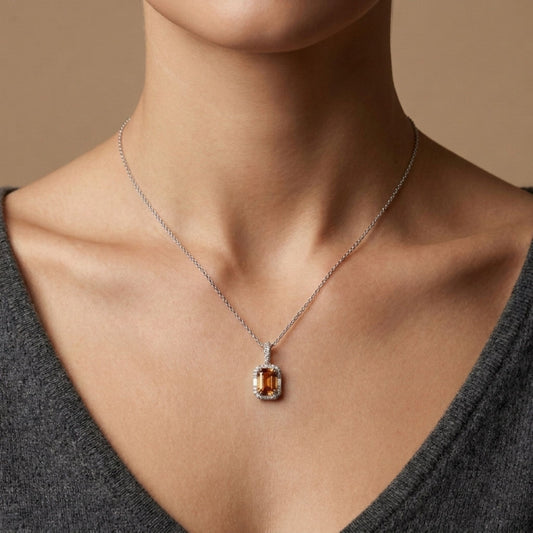18K 1.54ct Emerald Cut Mandarin Garnet 0.25cttw White Diamonds Pendant