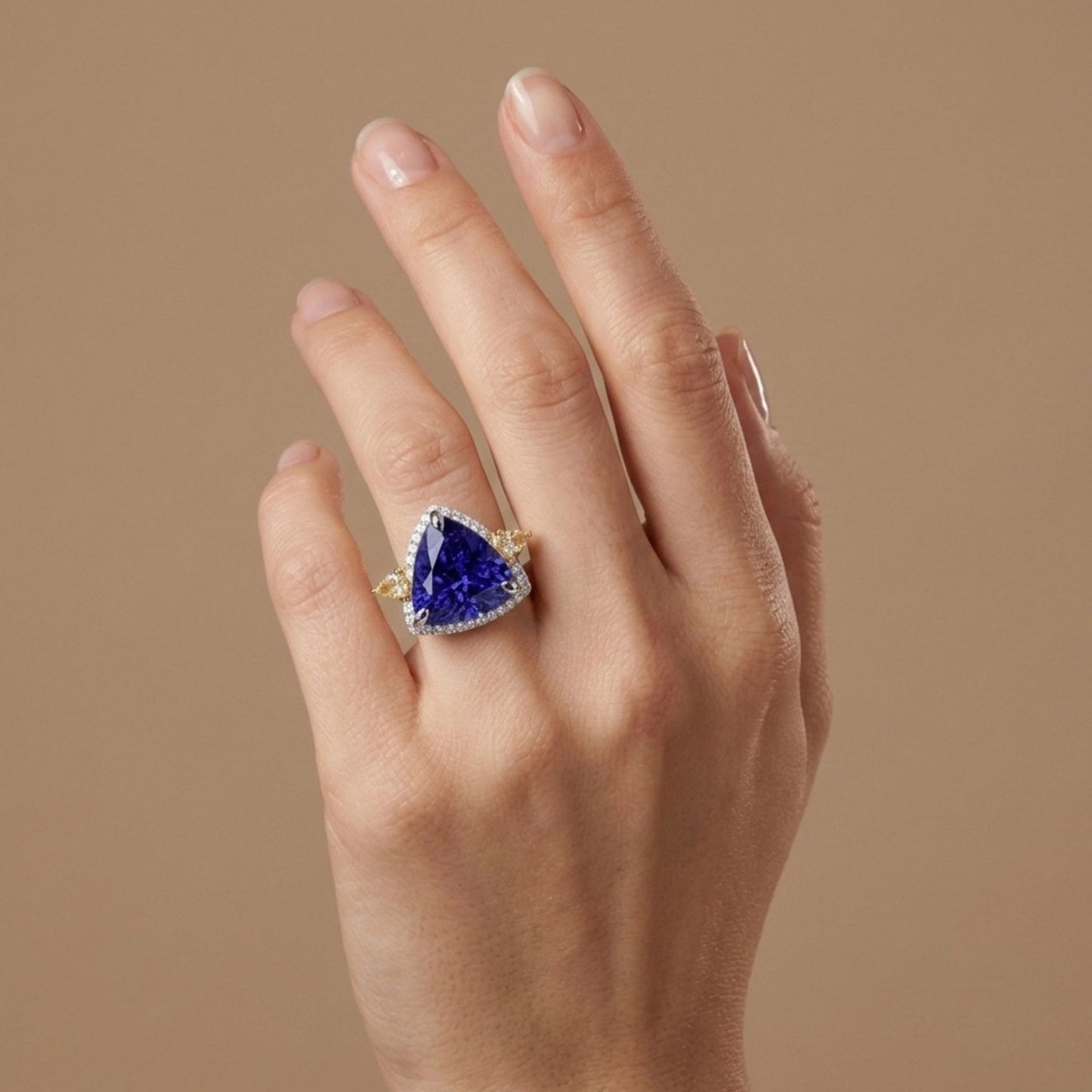 14K 8.60ct Trilliant Blue Wing Tanzanite 0.66cttw Yellow & White Diamonds Ring