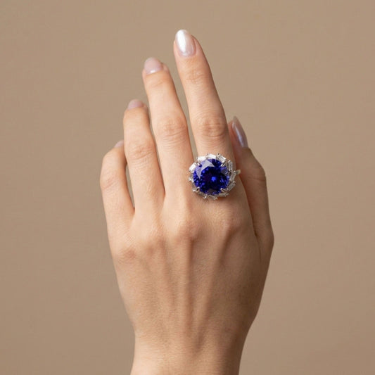 14K 12.74ct Round Blue Wing Tanzanite 1.15cttw Baguette White Diamonds Ring