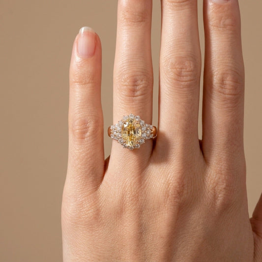 14K 4.45ct Oval Unheated Yellow Sapphire 1.18cttw VS White Diamonds Ring