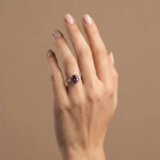 14K 3.87ct Oval Malaya Garnet 0.15cttw White Diamonds Ring