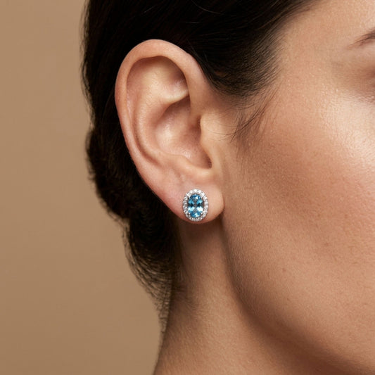 14K 1.68cttw Oval Blue Zircon 0.18cttw White Diamonds Stud Earrings