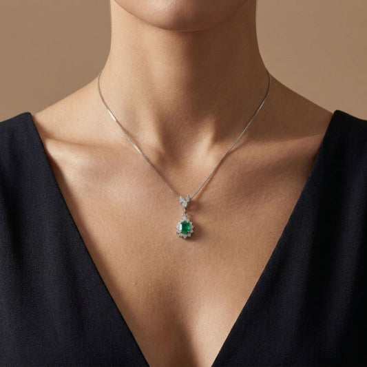 Platinum 0.31ct Emerald Cut Colombian Emerald 0.46cttw White Diamonds Necklace