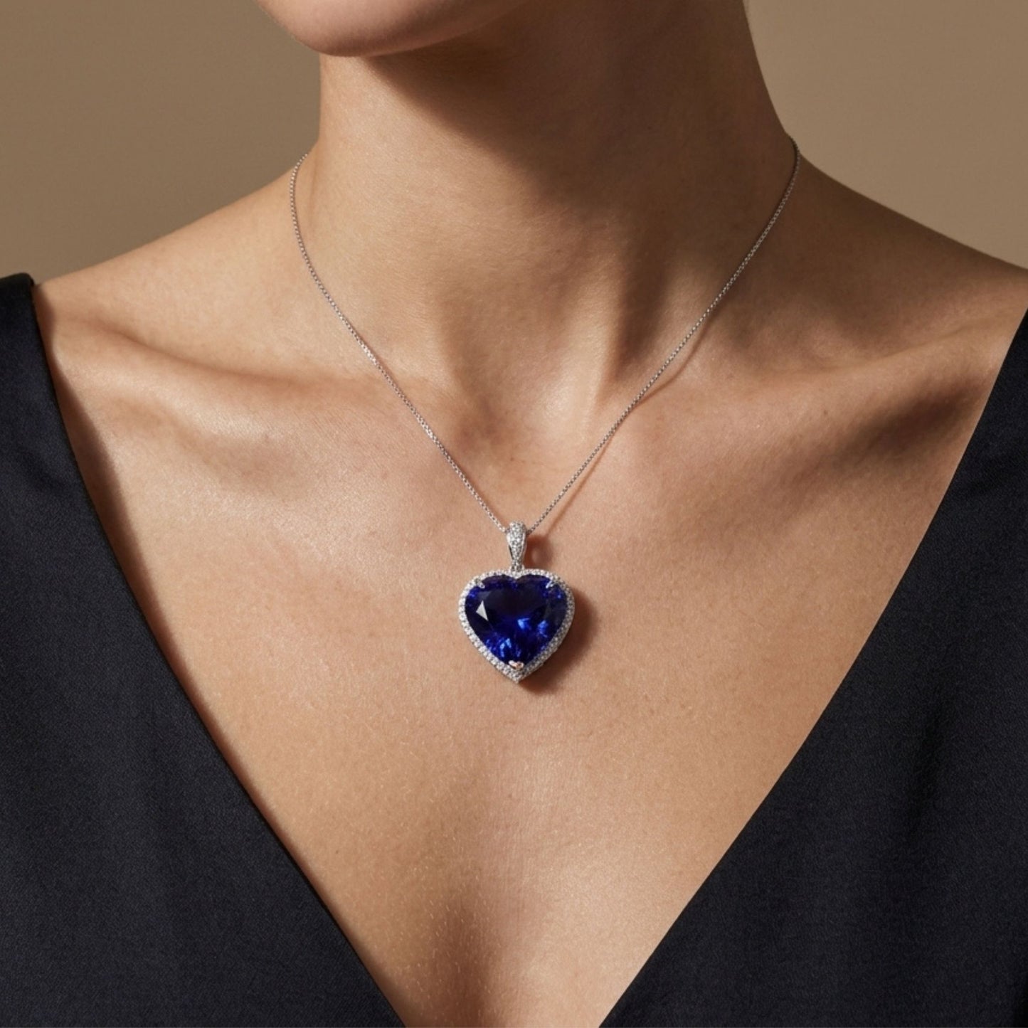 14K 35.23ct Heart Shape Blue Wing Tanzanite 1.00cttw VS White Diamonds Pendant