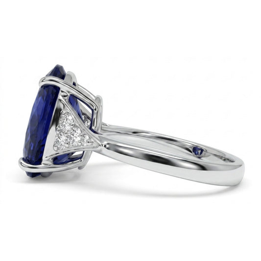 14K 6.45ct Oval Blue Wing Tanzanite 0.20cttw VS White Diamonds Ring