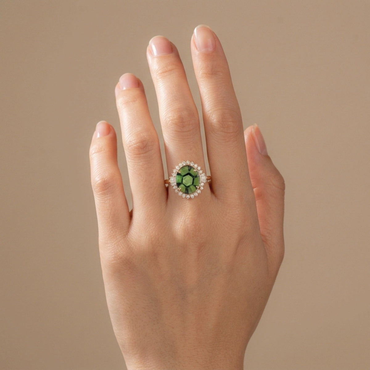 14K gold oval trapiche emerald ring with VS white diamonds