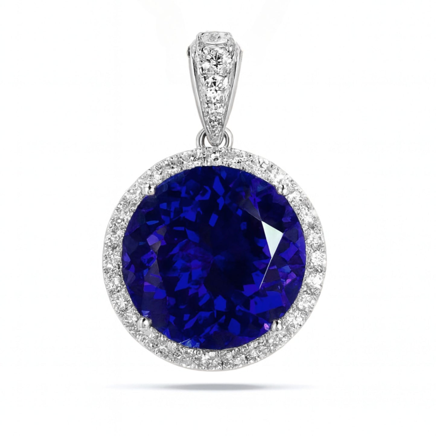 18K 18.68cttw Round Blue Wing Tanzanite 1.06cttw VS White Diamonds Pendant