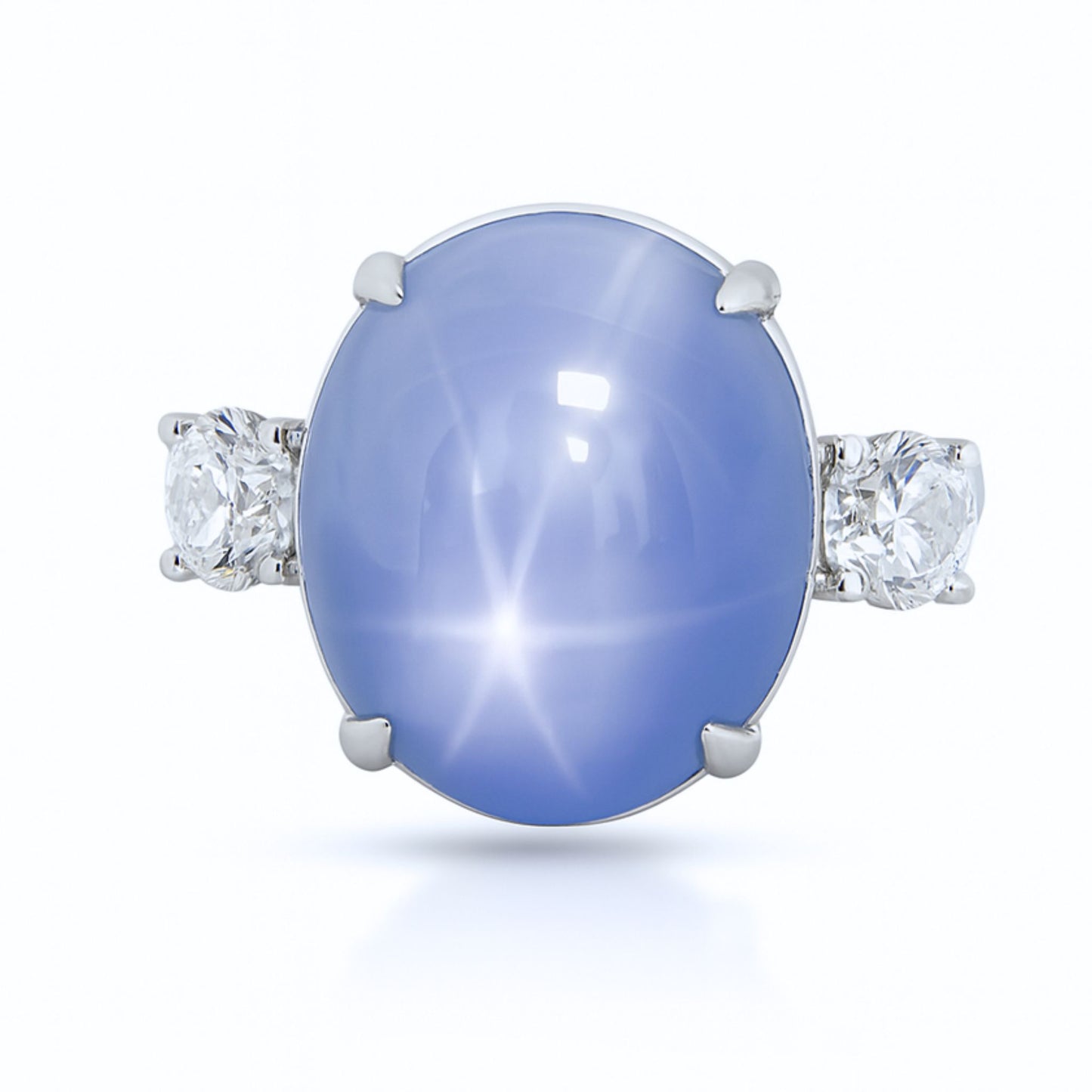 Platinum 27.47ct Oval Unheated Star Sapphire 1.14cttw White Diamonds Ring