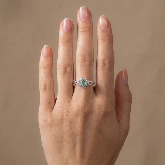 14K 0.38ct Oval Green Kornerupine 0.41cttw VS White Diamonds Ring