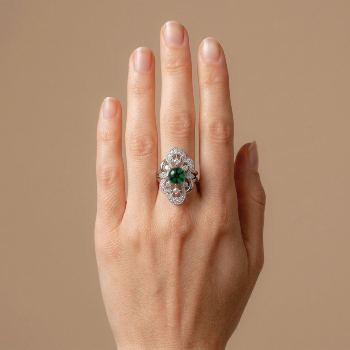 Platinum 1.98ct round trapiche emerald ring with 0.62cttw white diamonds