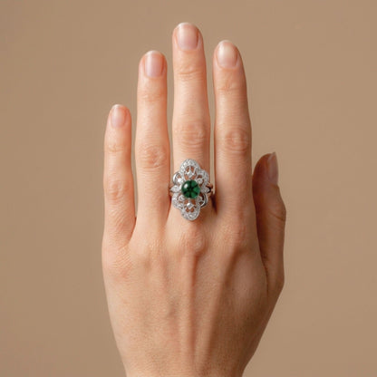 Platinum 1.98ct round trapiche emerald ring with 0.62cttw white diamonds