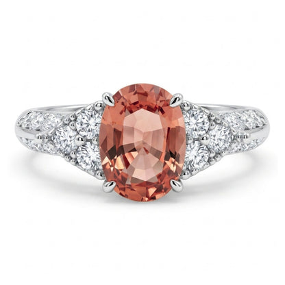 Platinum 0.95ct Oval Padparadscha 0.36cttw White Diamonds Ring