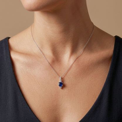 14K 0.45ct Oval Blue Sapphire 0.07cttw White Diamonds Pendant