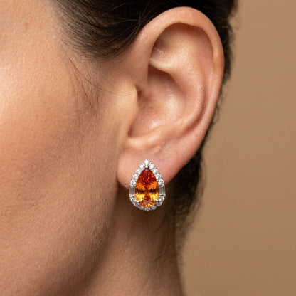 18K 4.43cttw Pear Shape Mandarin Garnet 0.28cttw VS White Diamonds Stud Earrings