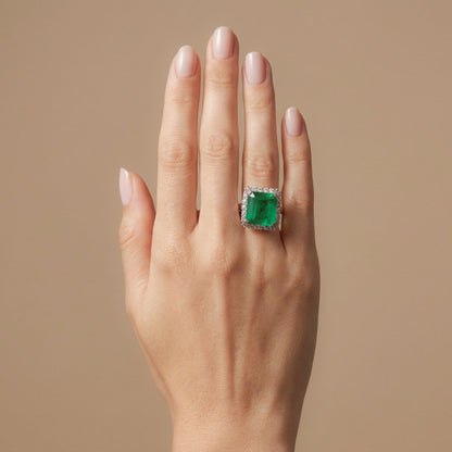 Platinum 8.63ct Emerald Cut Colombian Emerald 0.98cttw White Diamonds Ring