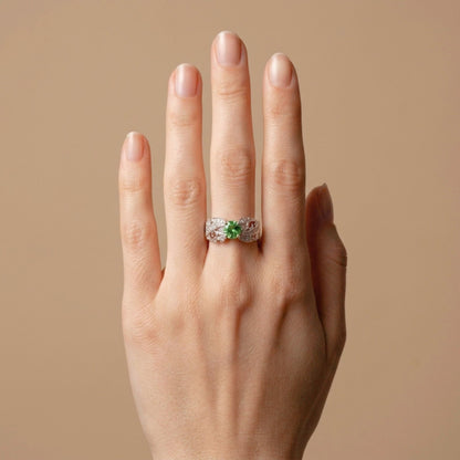 14K 1.12ct Oval Tsavorite 0.21cttw VS White Diamonds Ring