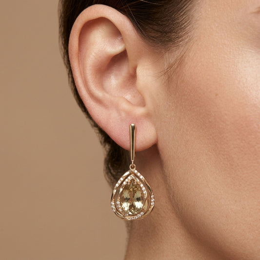 14K 3.30cttw Pear Shape Color Change Diaspore 0.20cttw VS White Diamonds Drop Earrings