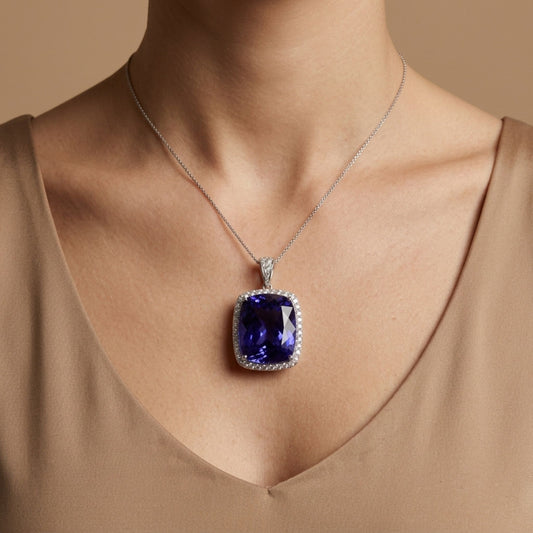 18K 22.95ct Cushion Blue Wing Tanzanite 0.89cttw VS White Diamonds Pendant