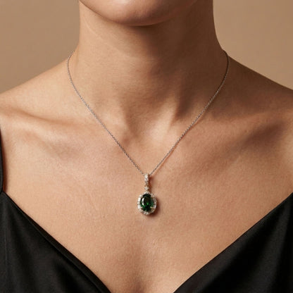 18K 1.15ct Oval Tsavorite 0.23cttw VS White Diamonds Pendant