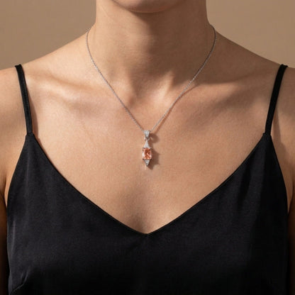 Platinum 0.57ct Radiant Cut Sweet Home Rhodochrosite 0.04cttw VS White Diamonds Pendant
