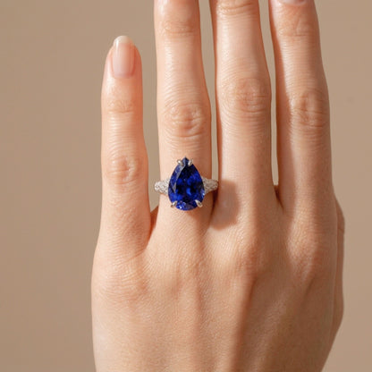 14K 8.51ct Pear Shape Blue Wing Tanzanite 1.07cttw VS White Diamonds Ring