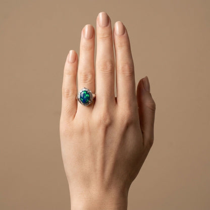 Platinum 3.78ct Oval Black Opal 0.38cttw White Diamonds Ring