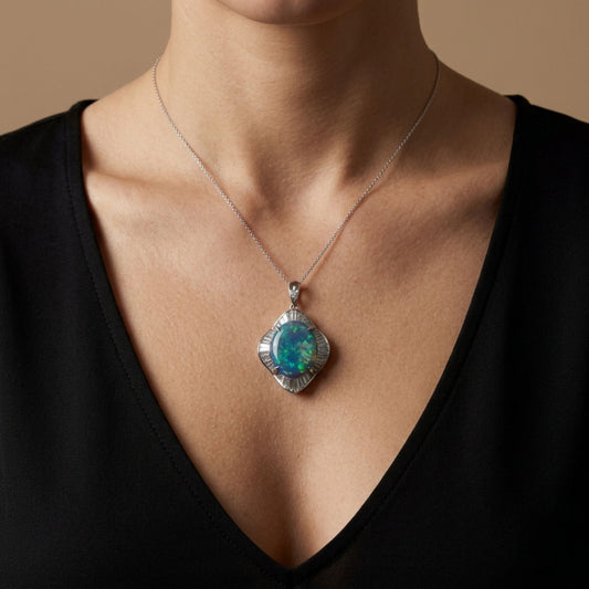 Platinum 9.03ct Oval Black Opal 2.20cttw White Diamonds Pendant
