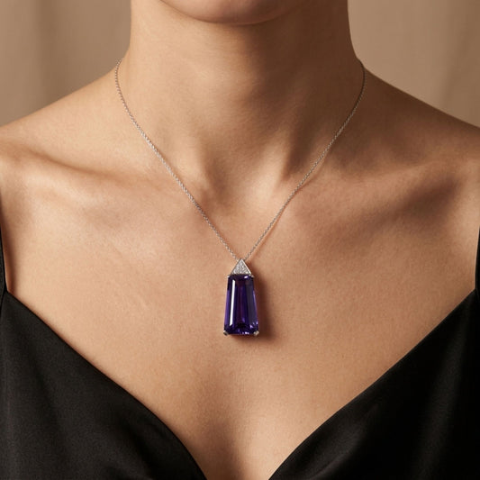 14K 12.52ct Fancy Cut Blue Wing Tanzanite 0.08cttw White Diamonds Pendant