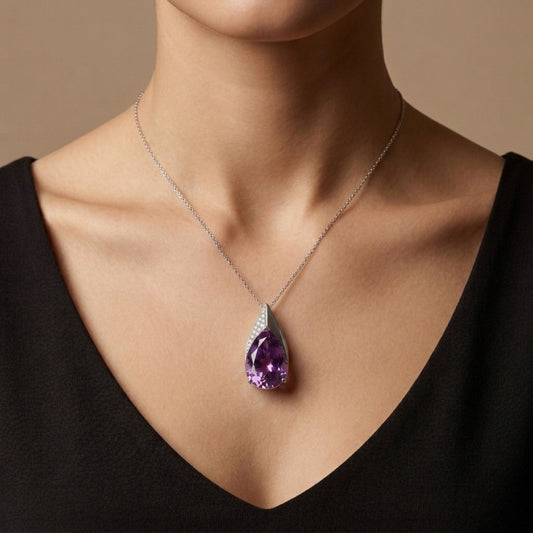 14K 12.29cttw Pear Shape Kunzite 0.15cttw VS White Diamonds Pendant