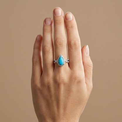 14K gold pear shape Sleeping Beauty turquoise ring with white diamonds
