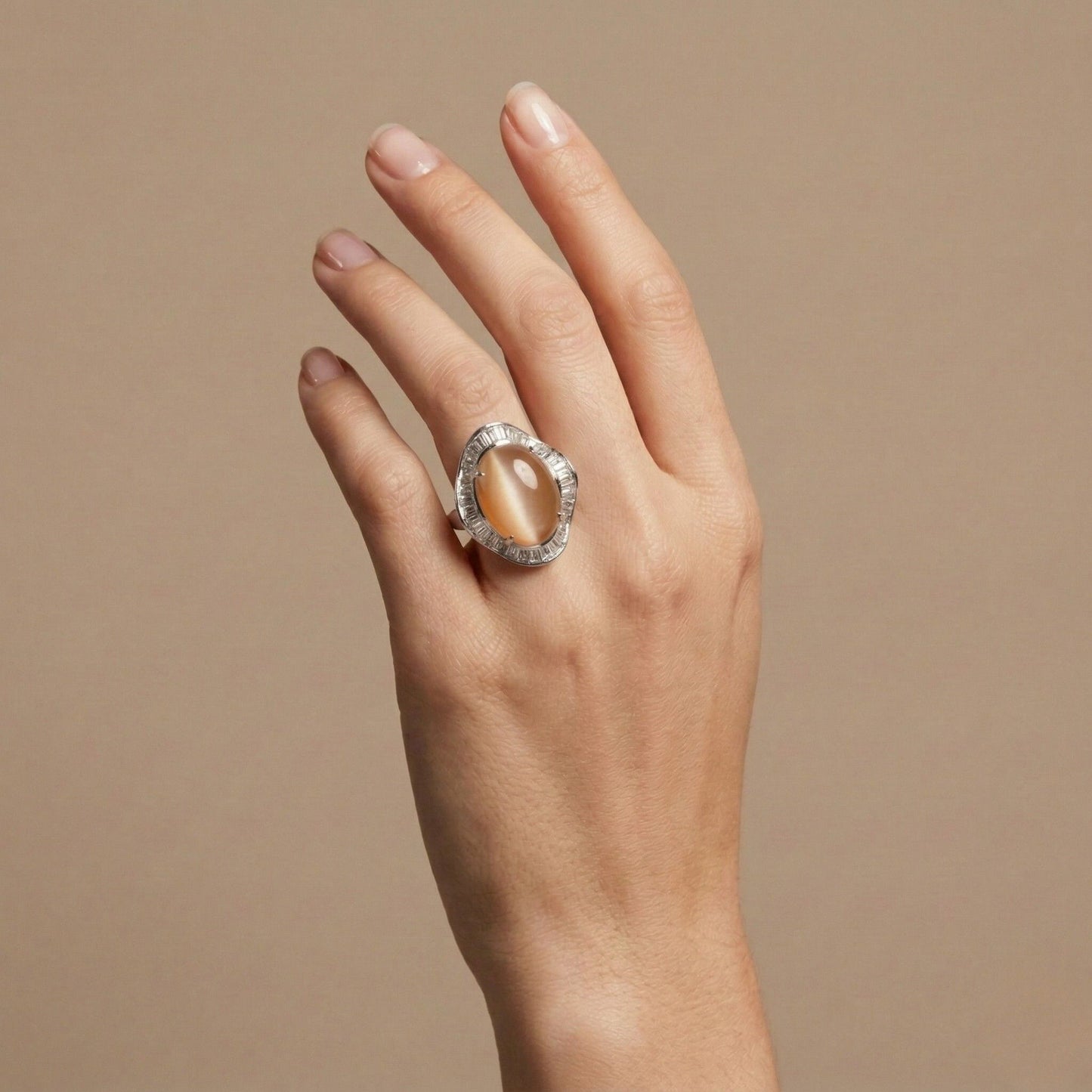 Platinum 9.57ct Oval Cat's Eye Moonstone 1.85cttw Tapered Baguette White Diamond Ring