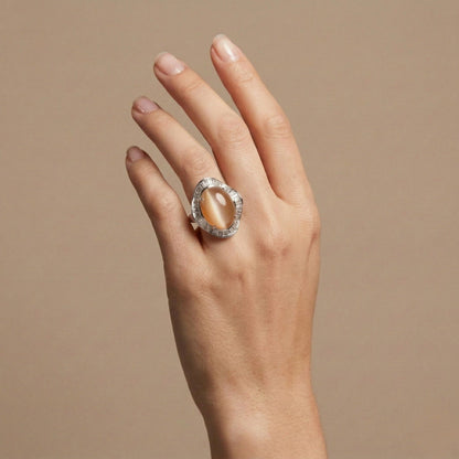 Platinum 9.57ct Oval Cat's Eye Moonstone 1.85cttw Tapered Baguette White Diamond Ring